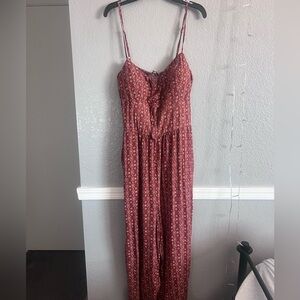 Super cute maroon jumpsuit. Built in bra and hardly worn!